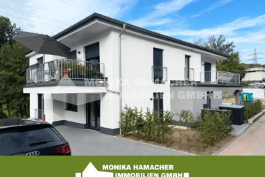 Neubau im Milchborntalweg! 3-Zimmerwohnung im Souterrain mit Terrasse und Garten